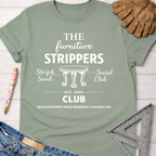 Women's funny woodworking graphic tee shirt for female woodworkers, makers, and DIY builders — Sawdust & Ponytails. Light green cotton crewneck t-shirt with "The Furniture Strippers Social Club" graphic, shown with jeans, work gloves, and a ruler.