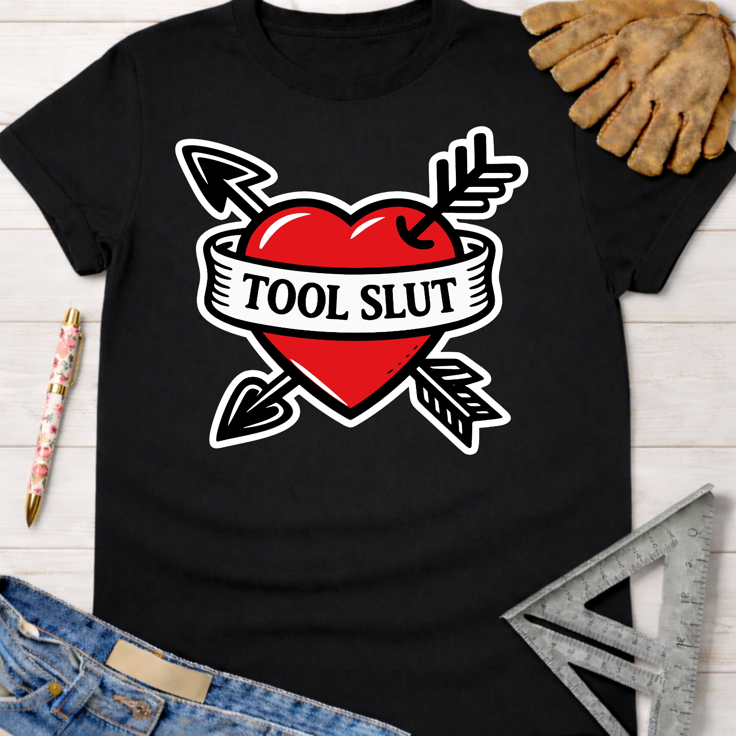 Black "Tool Slut" heart and arrows graphic tee for women. Women's funny woodworking graphic tee shirt for female woodworkers, makers, and DIY builders — Sawdust & Ponytails