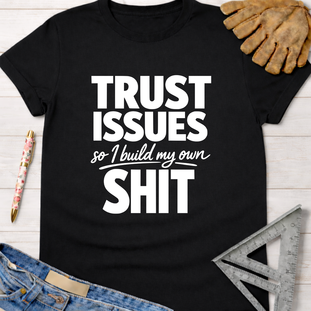 Black cotton "Trust Issues so I build my own SHIT" tee with work gloves, jeans, and a square. Women's funny woodworking graphic tee shirt for female woodworkers, makers, and DIY builders — Sawdust & Ponytails