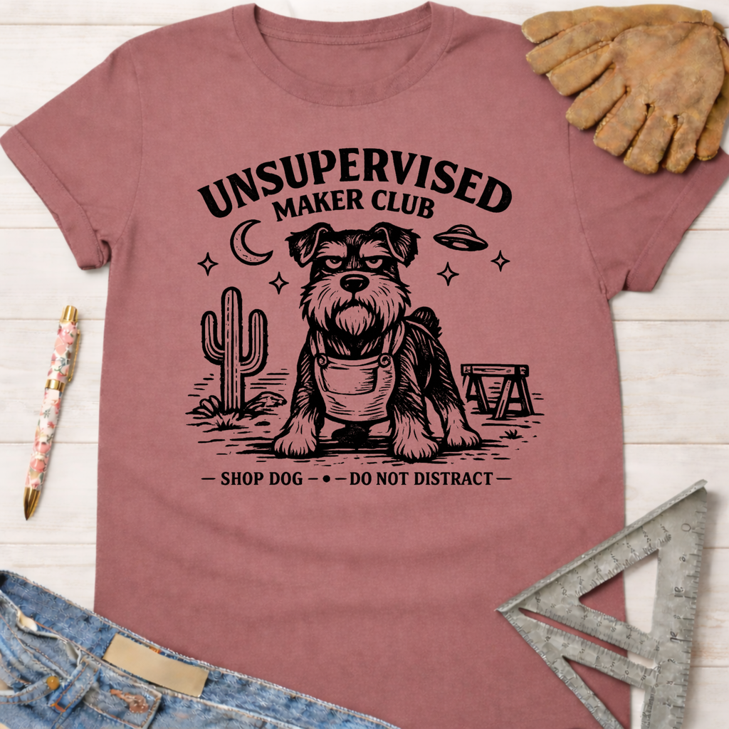 Women's funny woodworking graphic tee shirt for female woodworkers, makers, and DIY builders — Sawdust & Ponytails. Mauve t-shirt with "Unsupervised Maker Club" graphic featuring a dog in overalls.