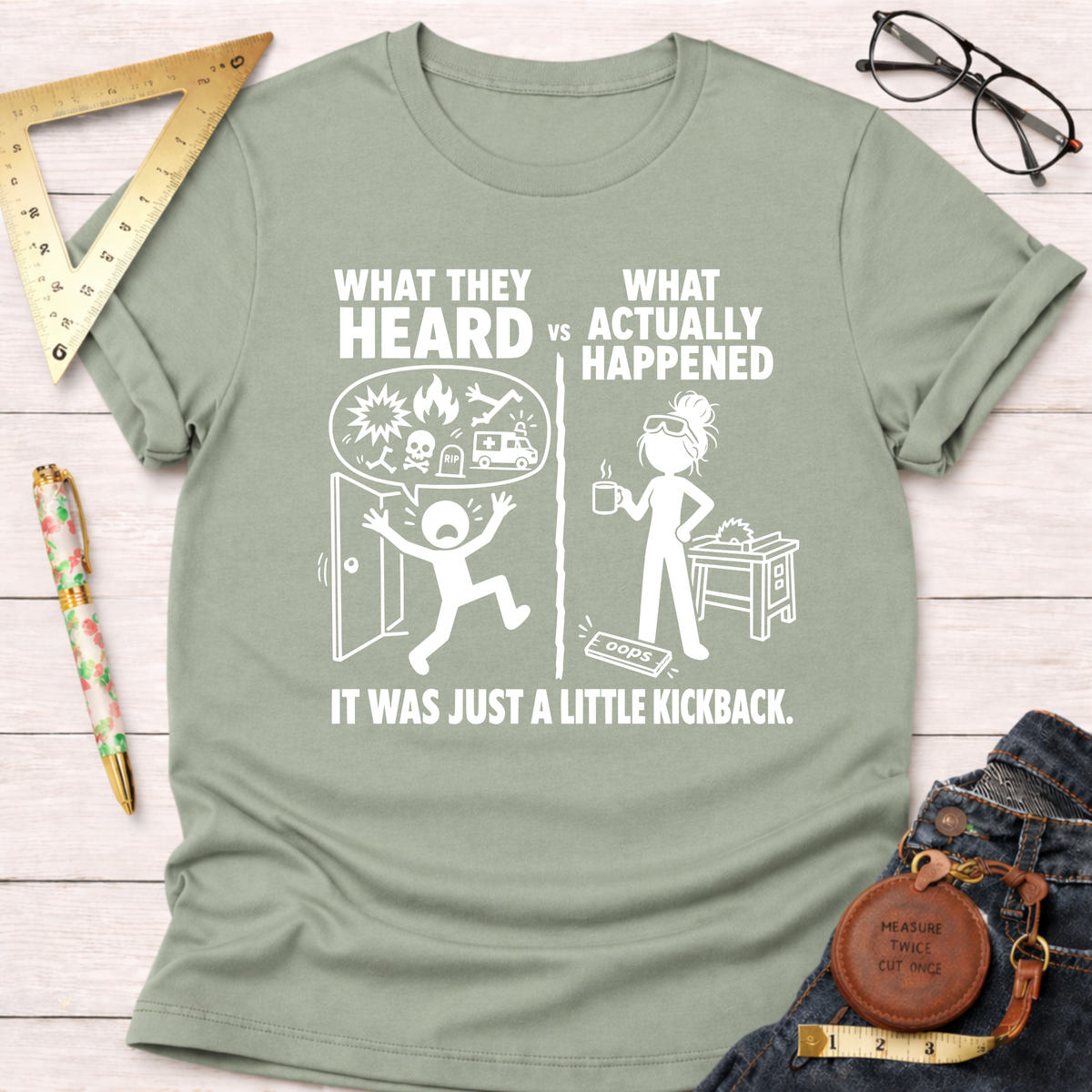 Women's funny woodworking graphic tee shirt for female woodworkers, makers, and DIY builders — Sawdust & Ponytails. Sage green cotton tee with "What They Heard VS What Actually Happened" design.