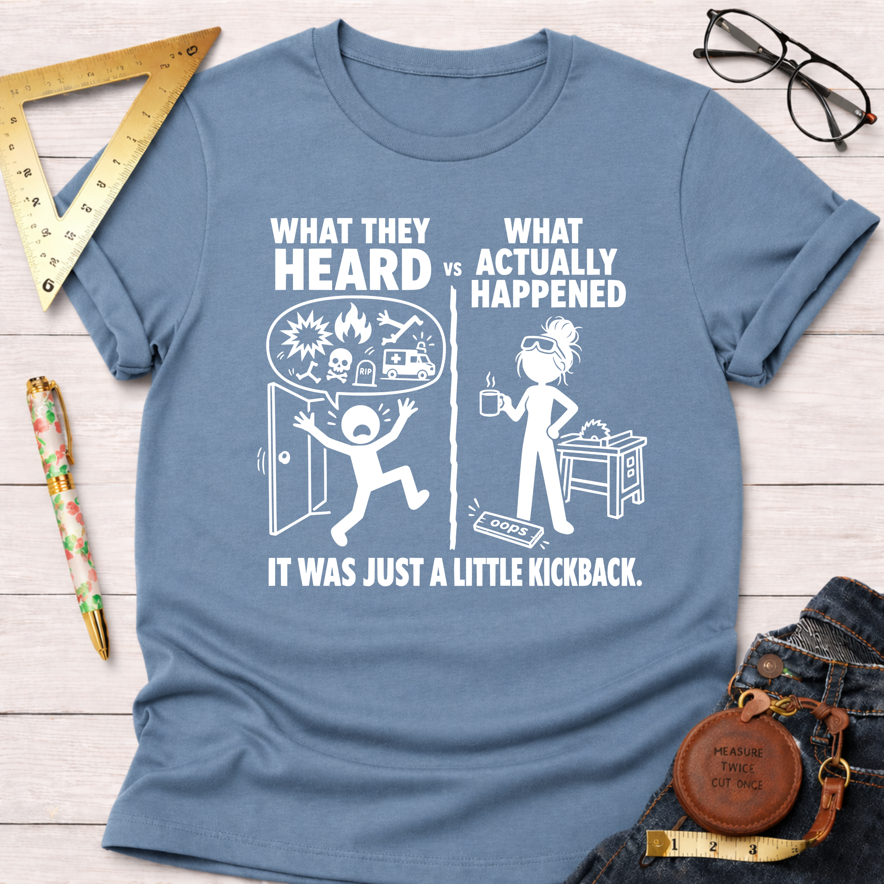 Women's funny woodworking graphic tee shirt for female woodworkers, makers, and DIY builders — Sawdust & Ponytails. Light blue cotton tee with "What They Heard vs What Actually Happened" design.