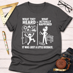 Women's funny charcoal gray cotton blend woodworking graphic tee shirt with "What They Heard VS What Actually Happened" design, "Sawdust & Ponytails