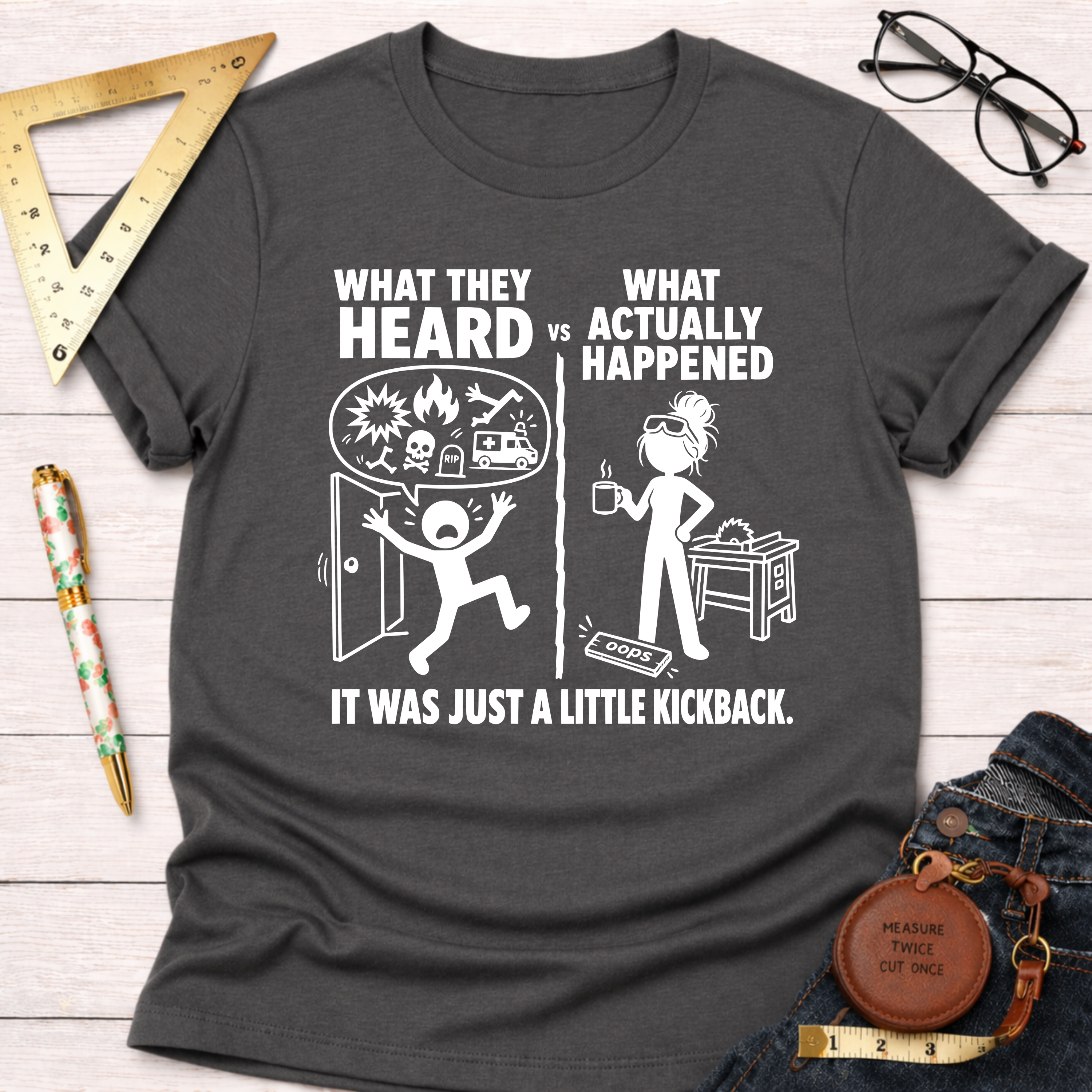 Women's funny charcoal gray cotton blend woodworking graphic tee shirt with "What They Heard VS What Actually Happened" design, "Sawdust & Ponytails