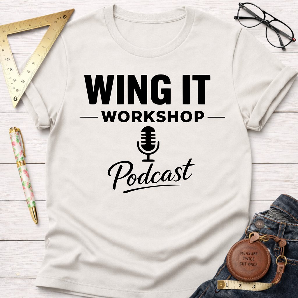 Cream cotton t-shirt with "Wing It Workshop Podcast" text and microphone graphic in black.