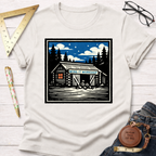 Off-white cotton "Wing It Workshop" t-shirt featuring a blue and black cabin graphic.