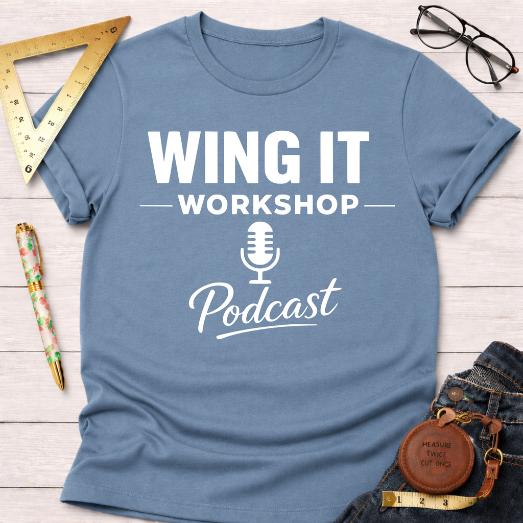 Light blue cotton "Wing It Workshop Podcast" tee with a microphone icon, styled with jeans and tools.