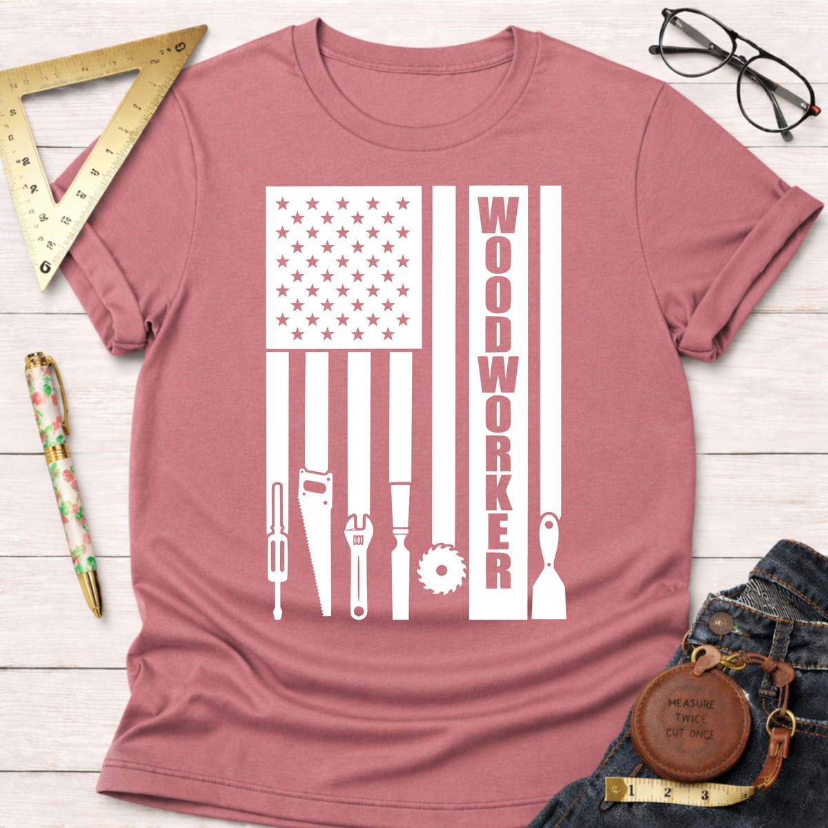 Woodworker Flag T-Shirt in dusty rose with white woodworking tools forming an American flag design.