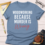 Blue t-shirt with "WOODWORKING BECAUSE MURDER IS Wrong" text, styled with jeans, ruler, and glasses.