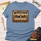 Light blue cotton t-shirt with a vintage wooden cassette tape graphic featuring "Workshop Playlist".
