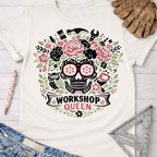 White cotton t-shirt with a floral skull, tools, and "Workshop Queen" graphic. Women's funny woodworking graphic tee shirt for female woodworkers, makers, and DIY builders — Sawdust & Ponytails