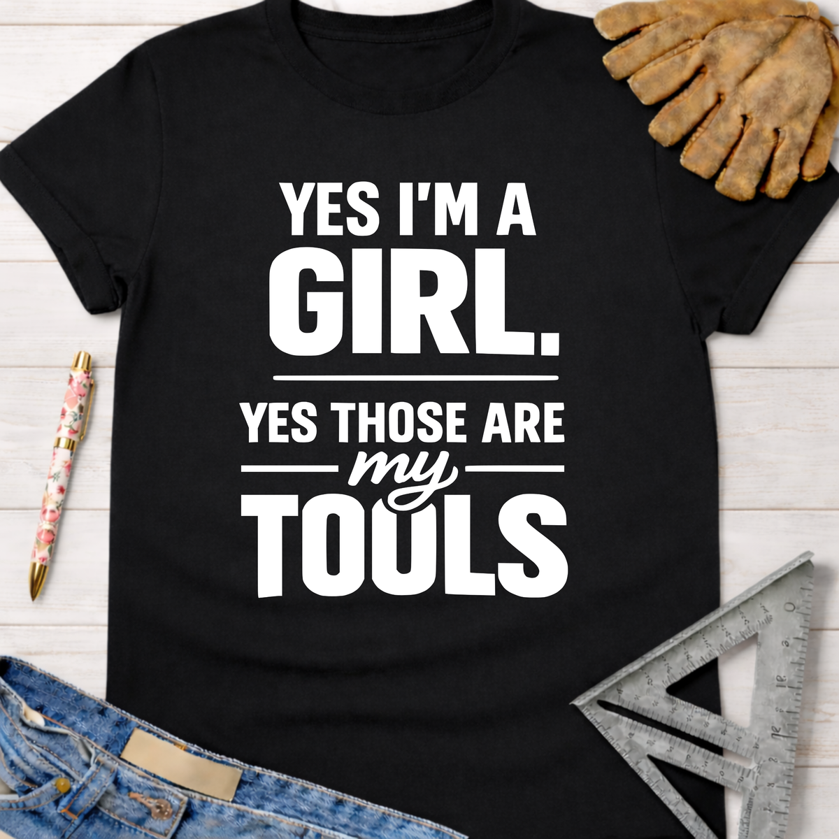 Black cotton tee with "YES I'M A GIRL. YES THOSE ARE MY TOOLS" in white text. Women's funny woodworking graphic tee shirt for female woodworkers, makers, and DIY builders — Sawdust & Ponytails