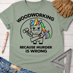 Women's funny woodworking graphic tee shirt for female woodworkers, makers, and DIY builders — Sawdust & Ponytails. Sage green cotton tee with a "Murderous Unicorn" holding a hammer and saw, text reads "Woodworking Because Murder is Wrong.
