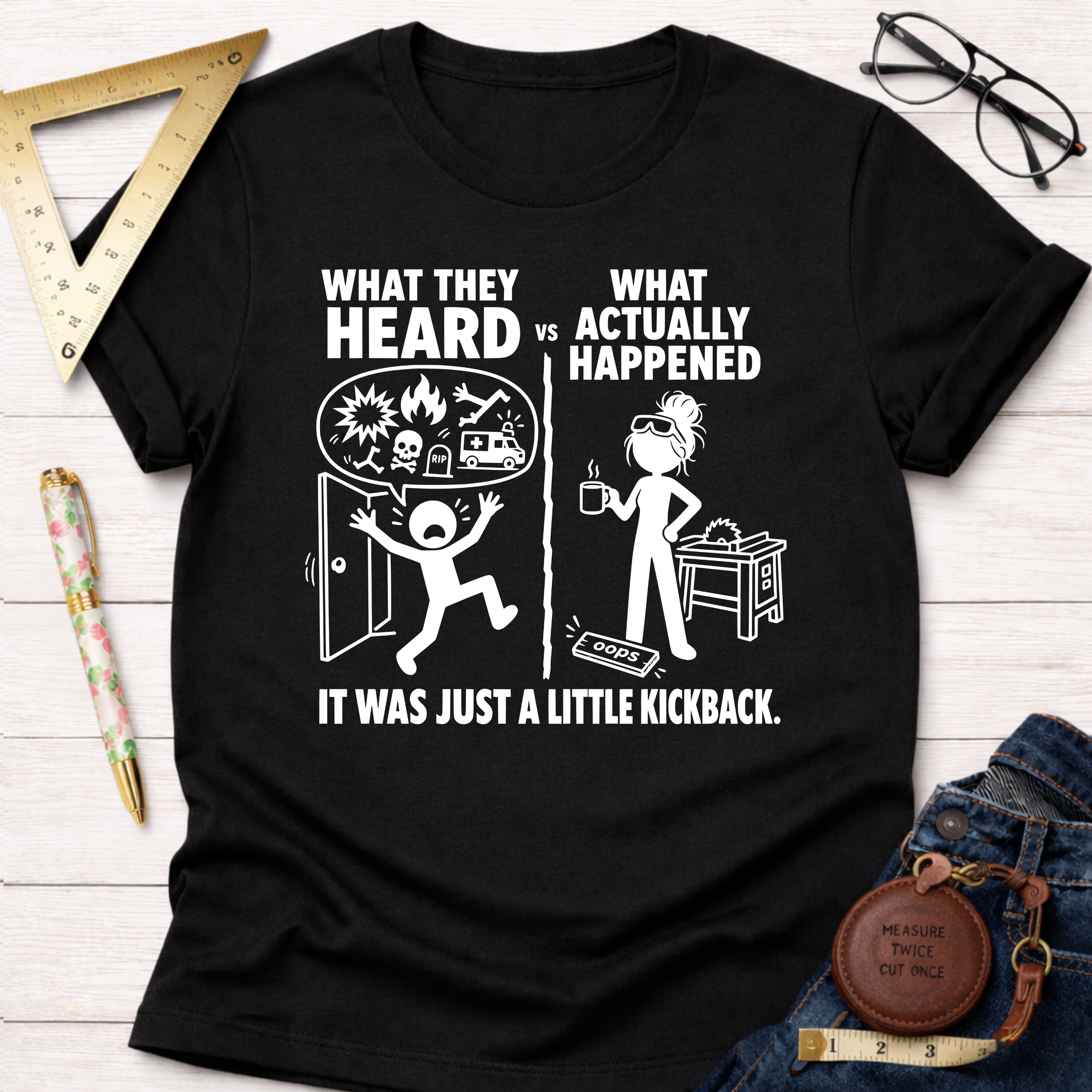 Black cotton Women's funny woodworking graphic tee shirt for female woodworkers, makers, and DIY builders — Sawdust & Ponytails, with "What They Heard VS What Actually Happened" text and humorous graphics.
